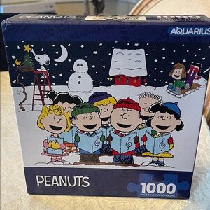 Peanuts Holiday Carolers 1000-Piece Puzzle - by Aquarius